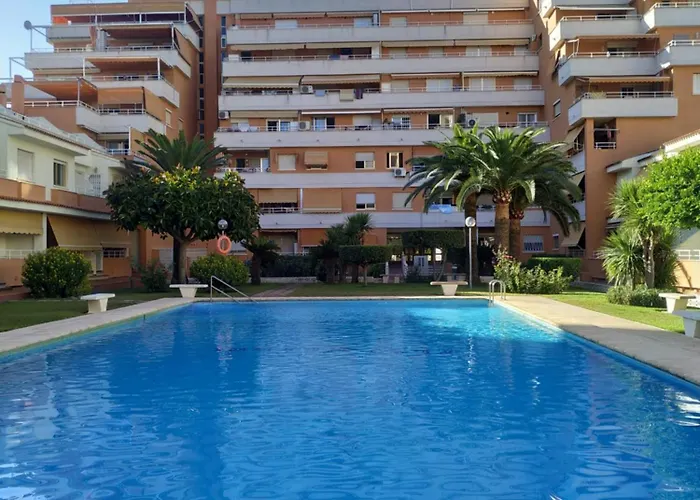 En Playa De Con Piscina